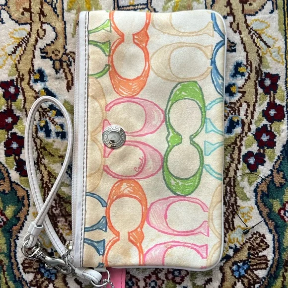 Coach Pink and Green Bag | TikTok Coach Cream Clutch with Pink and Green Accents display picture 1